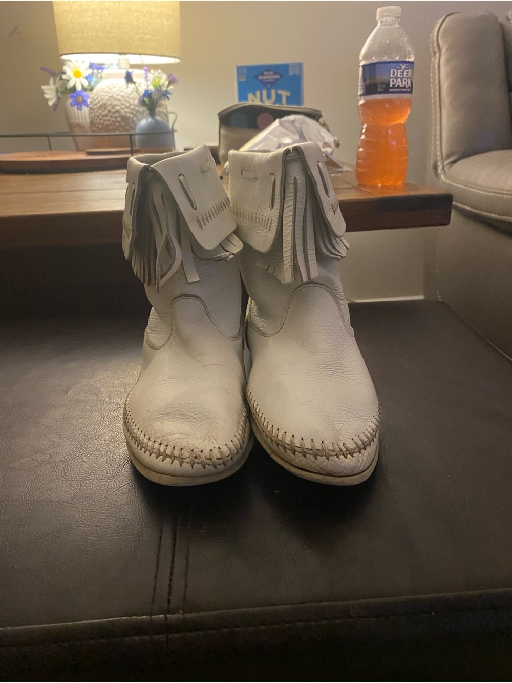Minnetonka Cream Fringe Ankle Moccasins